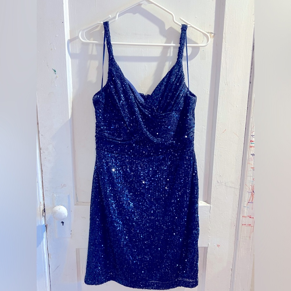 Blue sequins knee length dress. Wore  one time.